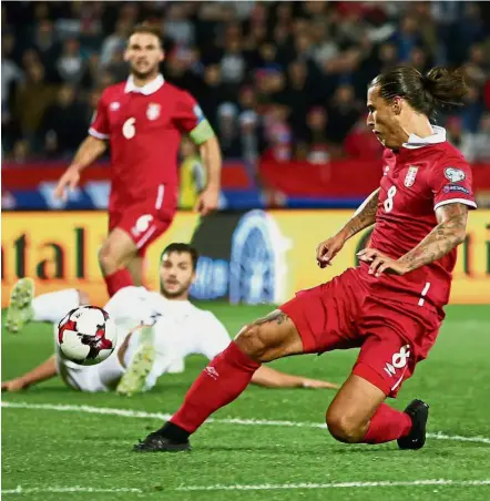  ?? — Reuters ?? Killer blow: Serbia’s Aleksandar Prijovic scoring against Georgia at the Rajko Mitic Stadium on Monday.