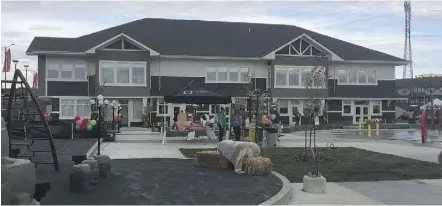  ??  ?? Finishing touches to the club house at The Orchards at Ellerslie were put in place just prior to last weekend’s grand opening. The 12,000-square-foot facility will host community events and fitness programs.