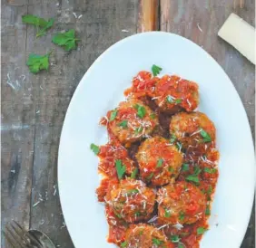  ?? LYNDA BALSLEV-TASTEFOOD ?? Smothered Italian meatballs marinara