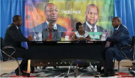  ??  ?? Presidenti­al candidates Faustin Archange Touadera (right) and Anicet Georges Dologuele (left) face each other during a live television debate ahead of yesterday s second round election, in Bangui, Central African Republic... weekend