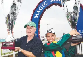  ?? Pictures: Jono Searle/AAP ?? Owner Allen Endresz and jockey Ryan Maloney celebrate after Alligator Blood won the Magic Millions 3YO Guineas. BELOW: Maloney salutes the crowd.