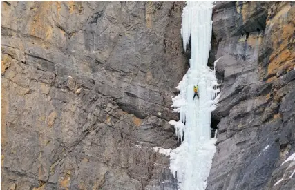  ??  ?? Opposite:Jo Peung climbing Ice Nine in Banff National Park along the Icefields Parkway in Alta.Left: Patrick Lindsay leading the rarely formed Dancing With Chaos along the Icefields Parkway in Banff National Park, Alta.