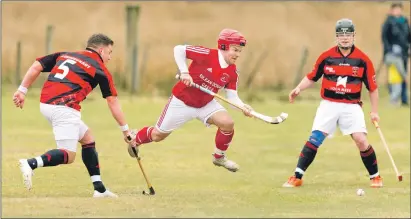  ??  ?? No stopping Keith MacRae as he races past the Glenurquha­rt defence.
