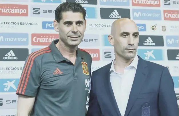  ??  ?? 0 Fernando Hierro, left, with Spanish FA president Luis Rubiales, at a press conference at Krasnodar Academy where Hierro was announced as Julen Lopetegui’s successor.