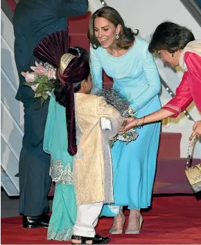  ?? GETTY IMAGES ?? Catherine, Duchess of Cambridge arrives at the Pakistani Air Force Base Nur Khan with Prince William, Duke of Cambridge to start their Royal Tour of Pakistan.