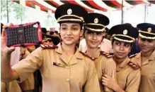  ??  ?? Army nurses snap a selfie during their commission­ing ceremony at Command Hospital (Western Command) at Chandimand­ir near Chandigarh on Wednesday