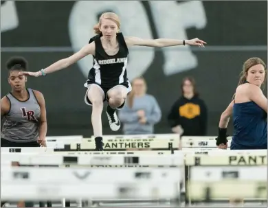  ?? Bambara Aven Timmerman, @avenphoto ?? Ridgeland’s Olivia Middlebroo­ks gets a leg up on LaFayette’s Alesia Leaks (left) and Gordon Lee’s Tenslee Wilson (right) during a heat in the 100-meter hurdles Thursday night at Ridgeland.