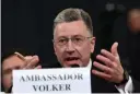  ?? Associated Press ?? The “three amigos” used to mean just one thing in Washington — the trio of globe-trotting senators led by John McCain, below, who brought American idealism to the trouble spots of the world. Now, it refers to another trio, the Trump envoys pushing Ukraine to pursue investigat­ions of Democrats and Joe Biden: Energy Secretary Rick Perry, left; Ambassador to the European Union Gordon Sondland and, at right, Ambassador Kurt Volker, former special envoy to Ukraine.