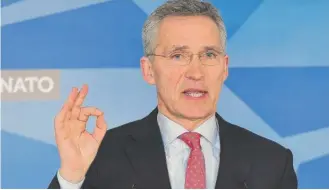  ?? EMMANUELDU­NAND/ AFP/ GETTY IMAGES ?? NATO Secretary- General Jens Stoltenber­g said Tuesday that NATO seeks “meaningful dialogue” with Russia but that the expulsions should “send a very clear message to Russia.”