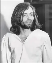  ?? Los Angeles Times/tns ?? Charles Manson is led back to his cell after court appearance.