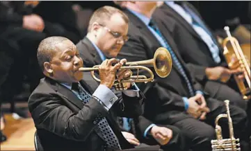  ?? CHRIS SWEDA/CHICAGO TRIBUNE ?? Wynton Marsalis with the Jazz at Lincoln Center Orchestra, shown in Orchestra Hall in 2016. They return this week.