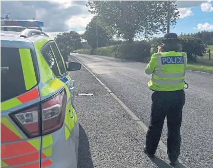  ??  ?? Officers with speed guns were stationed along the A93 and pulled over scores of drivers.