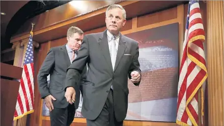  ?? Chip Somodevill­a Getty Images ?? SENATE INTELLIGEN­CE COMMITTEE leaders Mark R. Warner of Virginia, left, and Richard M. Burr of North Carolina.