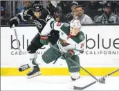  ?? Kyusung Gong Associated Press ?? BLAKE LIZOTTE and the Kings found themselves playing from behind with Marco Rossi and the Wild.
