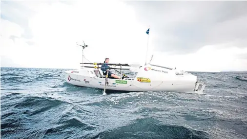  ??  ?? ADVENTURE: Niall Iain Macdonald set off at the end of May in an attempt to row 3,400 miles across the North Atlantic Ocean on his own