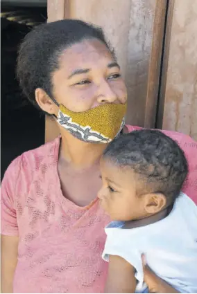  ?? (Photos: Joseph Wellington) ?? Shop owner, Natasha Thompson, scans a desolate Hellshire beach yesterday. “We wish it could better but it terrible fi everybody, worse back to school coming up. Wi nuh have nutten.”