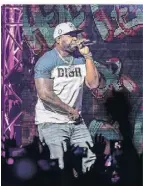  ?? FOTO: PAUL ZINKEN/DPA ?? 50 Cent auf der Bühne bei seiner aktuellen Tour.
