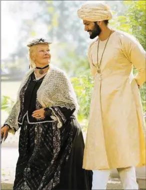  ??  ?? Judy Dench Queen Victoria and Ali Fazal as Abdul Karim in