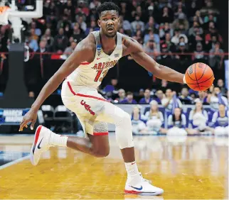  ?? KEVIN C. COX/GETTY IMAGES ?? Arizona centre Deandre Ayton is arguably the best choice as the player the Phoenix Suns should build around.