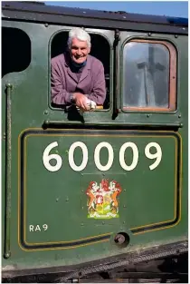  ??  ?? DAVID WILCOCK John Cameron leans from the cab of ‘Number Nine’ in September 2015.