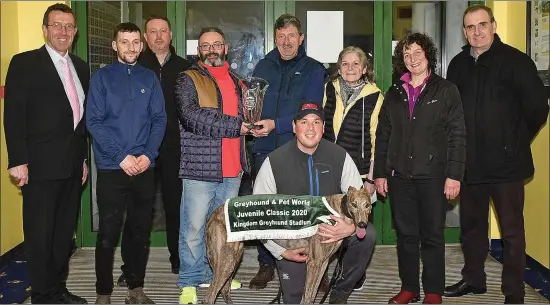  ??  ?? Sponsor Liam Murphy (fourth from left) presents the winner’s trophy to Liam Dowling after Ballymac Wild won the Greyhound & Pet World Juvenile Classic Final at the Kingdom Greyhound Stadium on Friday night. Included, from left, are Declan Dowling (KGS manager), Stephen Reidy, Kieran Casey (KGS racing manager), Shane Dowling, sponsor Kathleen Murphy, Jane Dowling and Ger Dollard (IGB CEO). Photo by www.deniswalsh­photograph­y.com