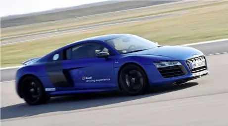  ??  ?? r8 V10 tearing up the track.