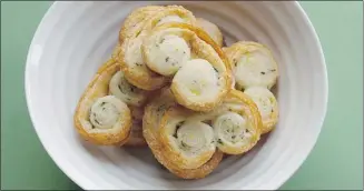  ?? Gwendolyn Richards, ?? Lemon Rosemary Palmiers bake up to be so much greater than the sum of their parts: Crisp and buttery, with a nice, caramel-like sweetness from the cooked sugar.