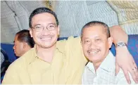  ??  ?? GAMBAR Arbani dan Hishammudd­in yang dirakam Allahyarha­m Tawfiq.