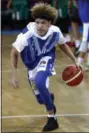  ?? ASSOCIATED PRESS FILE ?? BC Prienu Vytautas’s LaMelo Ball warms up before the Big Baller Brand Challenge friendly tournament game against BC Zalgiris-2 on Jan. 9 in Prienai, Lithuania.