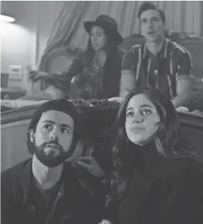  ??  ?? Ramy (Ramy Youssef) eagerly gets together with Sarah (Molly Gordon), but refuses to take molly with her at a party.