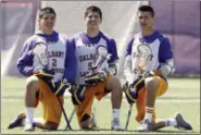  ?? AP FILE ?? University at Albany lacrosse players Miles Thompson (2), Ty Thompson (91) and Lyle Thompson (4) pose after practice in Albany, N.Y. in 2014. The Thompsons, from the Onondaga Nation outside Syracuse, gave a jolt to the sport’s popularity, and they’re...