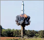  ?? AP/KOREAN CENTRAL NEWS AGENCY/KOREAN NEWS SERVICE ?? The launch of a medium-range missile is shown in this photo released Monday by North Korea. The government said it’s ready to mass-produce the missile, calling it an “answer” to President Donald Trump’s policies.