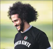  ?? Carmen Mandato / TNS ?? Colin Kaepernick looks on during his NFL workout this past November in Riverdale, Ga.