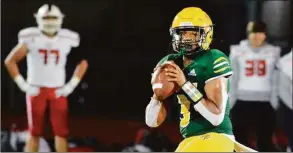  ?? Dave Phillips / Hearst Connecticu­t Media ?? Hamden quarterbac­k J.J. Gibson threw for four touchdowns against Fairfield Prep Friday night.