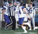  ?? Tyler Sizemore / Hearst Connecticu­t Media ?? Darien defensive back Joe Cesare (4) celebrates after one of his three intercepti­ons in Sunday’s win over New Canaan in the CIAC Class LL semifinal.