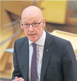  ?? Pictures: Mhairi Edwards/Fraser Bremner. ?? Top: The Scottish Government has announced that it is planning for all pupils to return to school full-time from August 11. Above: Education Secretary John Swinney addressing MSPs on the subject at Holyrood yesterday.