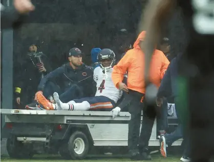  ?? BRIAN CASSELLA/CHICAGO TRIBUNE PHOTOS ?? BEARS
Bears safety Eddie Jackson leaves on a cart in the second quarter on Sunday at MetLife Stadium in East Rutherford, N.J.