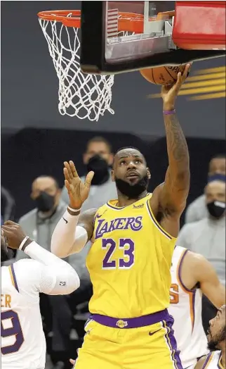  ?? Christian Petersen Getty I mages ?? ONE FORMER TEAM doctor wonders if the short offseason left enough recovery time for players such as LeBron James, above, and other stars who could be rested more in a 72- game season.