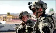  ??  ?? Staff Sgt. Robert Bales, left, is seen during an exercise at the National Training Center in Fort Irwin, California, in this 2011 handout photo. (REUTERS)