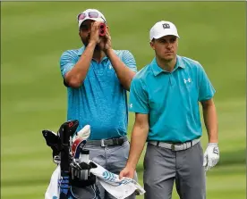  ?? SAM GREENWOOD / GETTY IMAGES ?? Jordan Spieth looks over a shot during a practice round prior to the World Golf Championsh­ips-Bridgeston­e Invitation­al at Firestone Country Club South Course on Tuesday in Akron, Ohio.