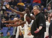  ?? BILL WIPPERT - THE ASSOCIATED PRESS ?? West Virginia head coach Bob Huggins reacts during the second half of a first-round men’s college basketball game against Bucknell in the NCAA Tournament, Thursday in Buffalo. West Virginia won, 86-80.