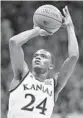  ?? ED ZURGA/GETTY ?? Lagerald Vick led Kansas with 29 points Saturday.