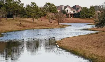  ?? Photos by Melissa Phillip / Staff photograph­er ?? Even with other cities implementi­ng flood-mitigation technology, it’s hard to find a test case that would handle the volumes of water seen in the Houston region.