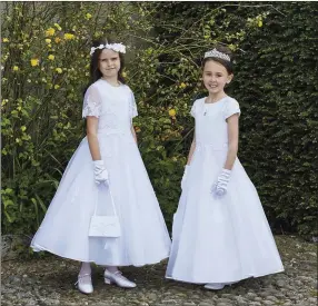  ??  ?? A large selection of Holy Communion Dresses available at Mullaney Brothers.