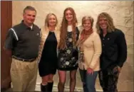  ??  ?? Elyse Burch (center) is the scholarshi­p recipient for Downingtow­n East. With her are (from left) Assistant Coach Bob Marsillo, Cindy MacKay SJW, Amy Shobaken SJW, and Head Coach Anthony DeCecco.