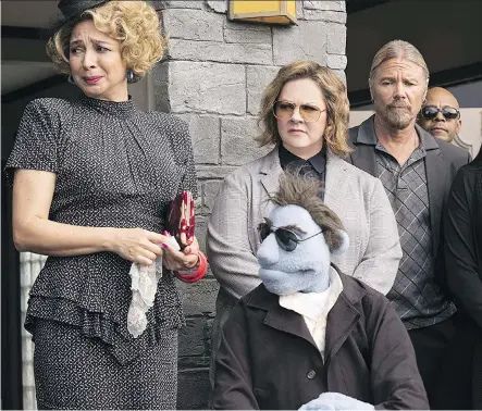  ?? VVS FILMS ?? Maya Rudolph, left, and Melissa McCarthy star alongside puppet Phil Philips (puppeteer Bill Barretta) in The Happytime Murders.