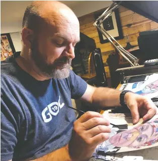  ??  ?? Steve Derrick works on a portrait at his home in Clifton Park, N.Y.