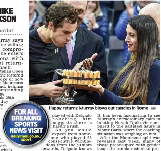  ?? USP ?? Happy returns: Murray blows out candles in Rome