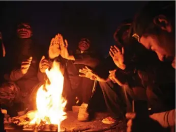  ?? RILEY SPARKS/FOR THE TORONTO STAR ?? Hundreds of migrants and refugees are stranded in a cornfield just shy of the Macedonian border.