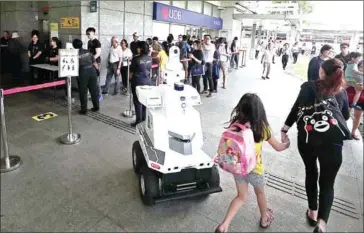  ?? KELVIN CHNG/THE STRAITS TIMES ?? An ST Engineerin­g roving robot with surveillan­ce capabiliti­es deployed during ‘Exercise Station Guard’ at the Hougang MRT Station in December. Innovation is a big part of the defence technology group’s growth plan, says its president and CEO Vincent Chong.